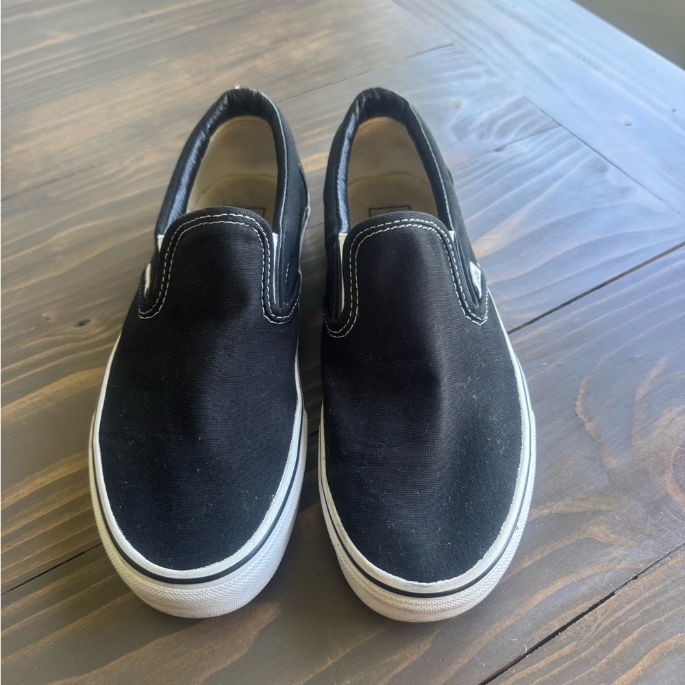 Vans Black canvas slip-ons